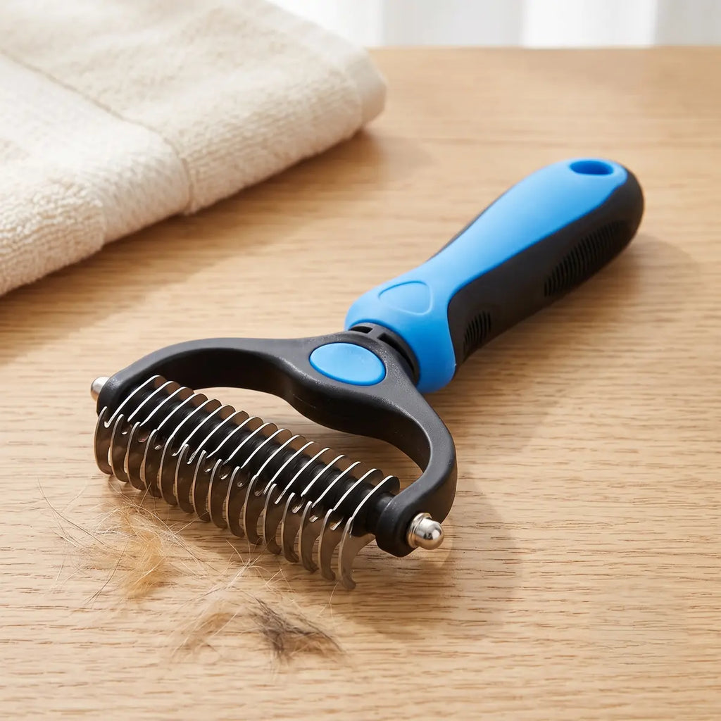 Brosse démêlante double face pour chien, manche bleu et lames en acier